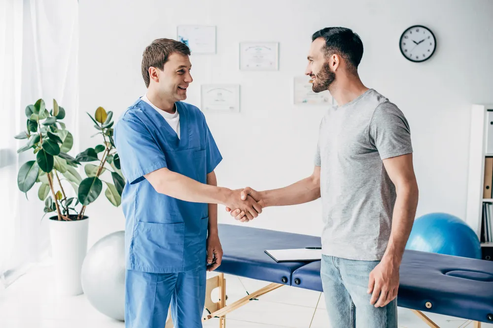 New Life Rehab Clinic team welcoming a patient